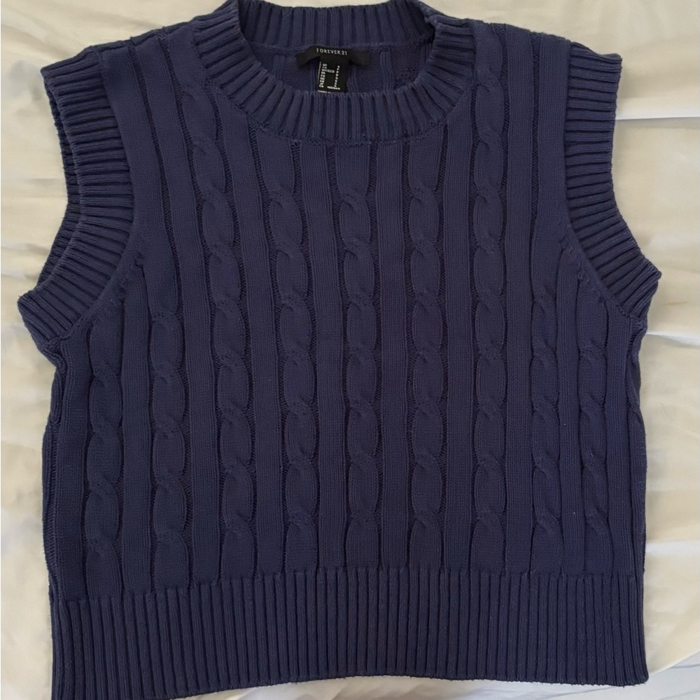 Cute dark blue sweater vest!